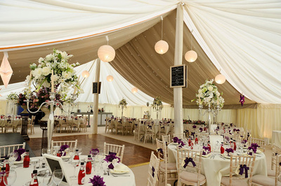 traditional marquue with ivory starlight ceiling and hanging lanterns
