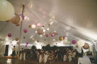 Traditional marquee, 80 lit paper lanterns, folding wooden chairs, matting and long tables dorset