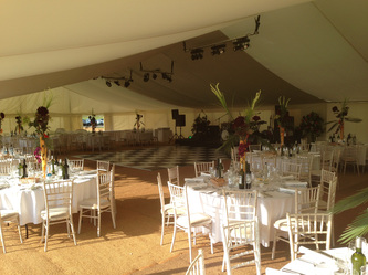 dorset wedding marquee Coconut matting, flat ivory lining, black and white dance floor, ivory starlight ceiling
