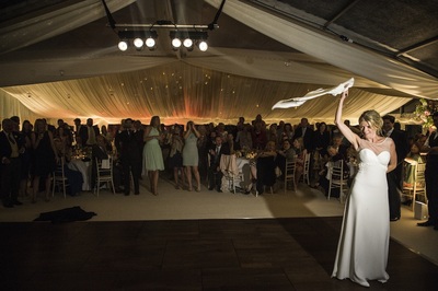 wedding marquee with cruciform roof, wooden parquet dance floor with hanging spots