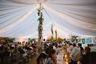 traditional pole marquee with ivory linings and fairy lights