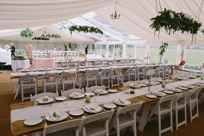 rustic tables with white folding chairs dorset